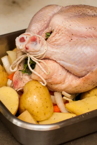chicken in roasting pan