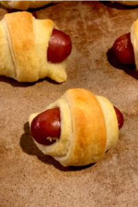 mini pigs in a blanket