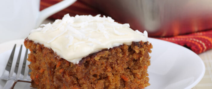Homemade Carrot Cake Recipe A slice of carrot cake on plate