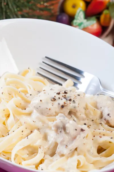 bowl of instant pot chicken fettuccine alfredo