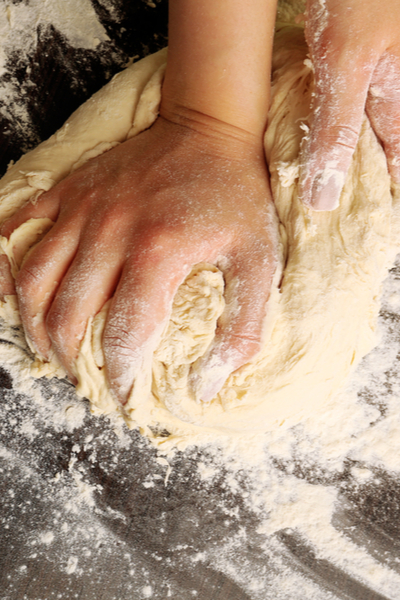 kneading thin pizza crust dough