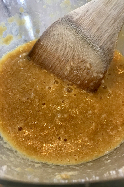 mixing banana bread batter 