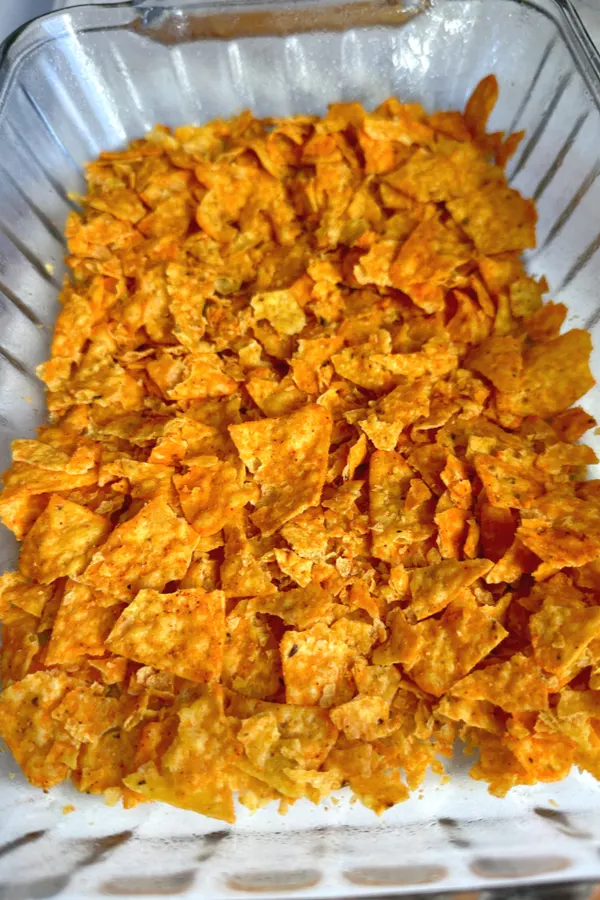 crushed doritos in baking dish 