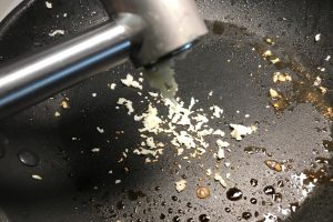 garlic press in pan