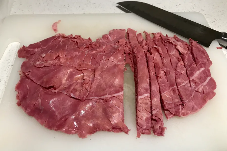 cutting up corned beef 