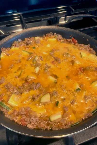 cheddar cheese on zucchini ground beef skillet 