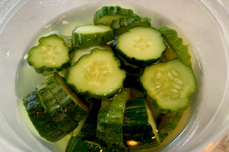 A jar filled with pickled cucumbers