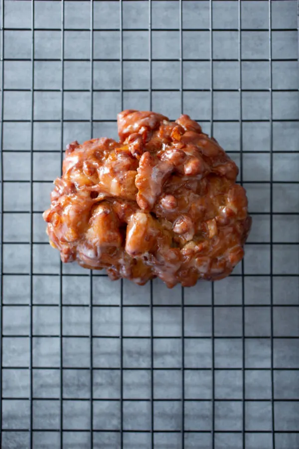 apple fritter on cooling rack