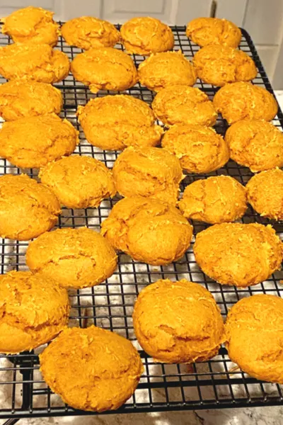 pumpkin cookies on cooling rack 