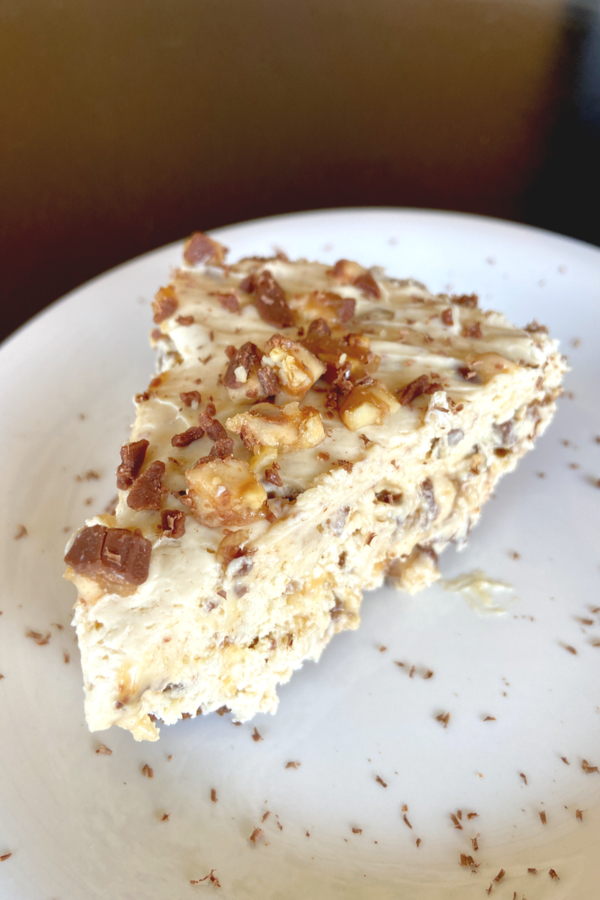 piece of no bake snickers cheesecake