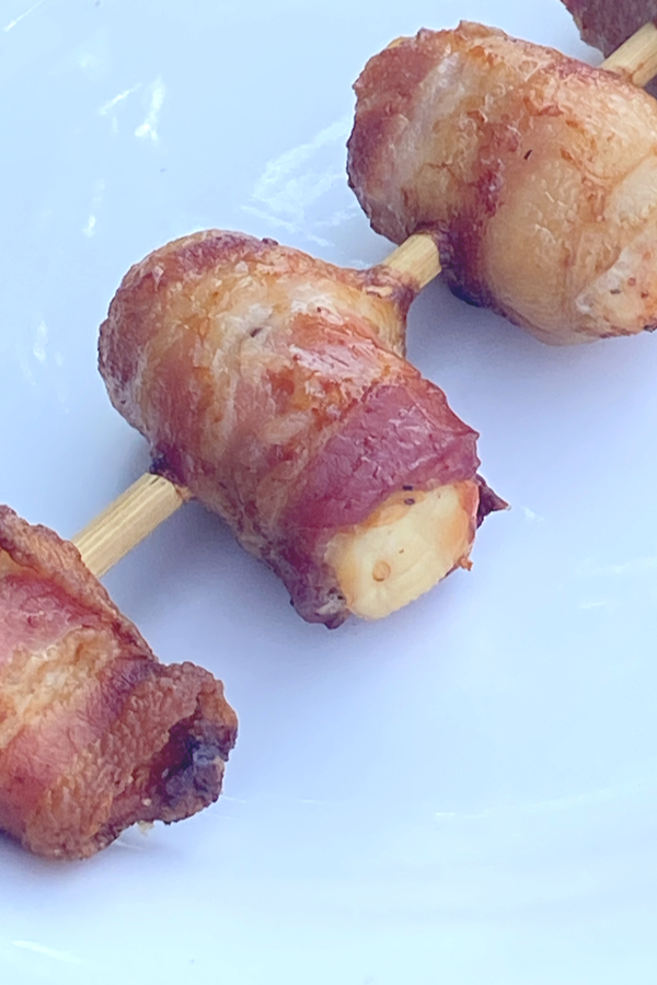 serving bacon chicken skewers