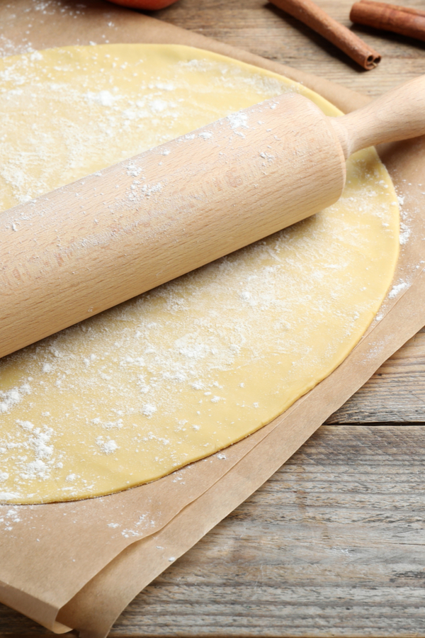 rolling out pie crust dough