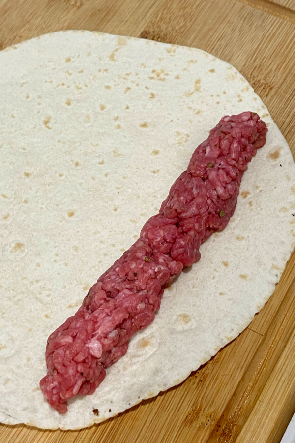 raw beef on tortilla 