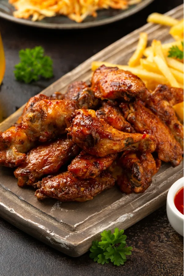 Caribbean Jerk Wings with French fries