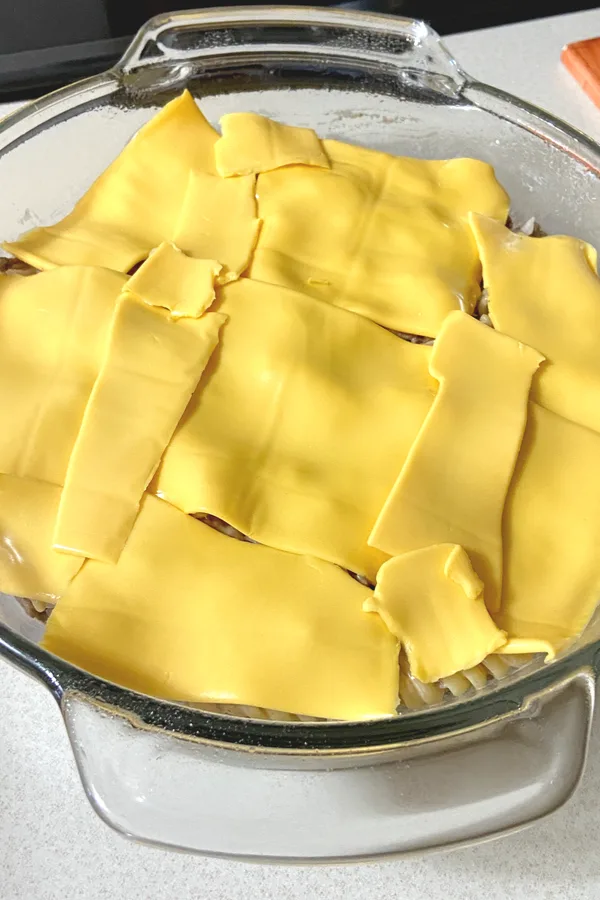 american cheese slices over a casserole