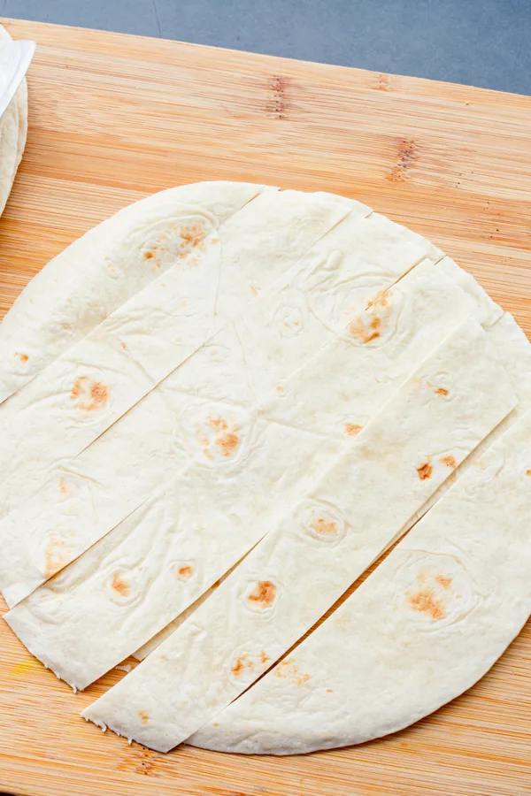 cutting tortilla into strips