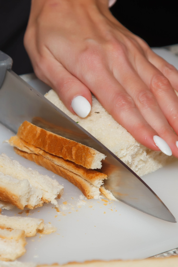 cutting crust off bread 