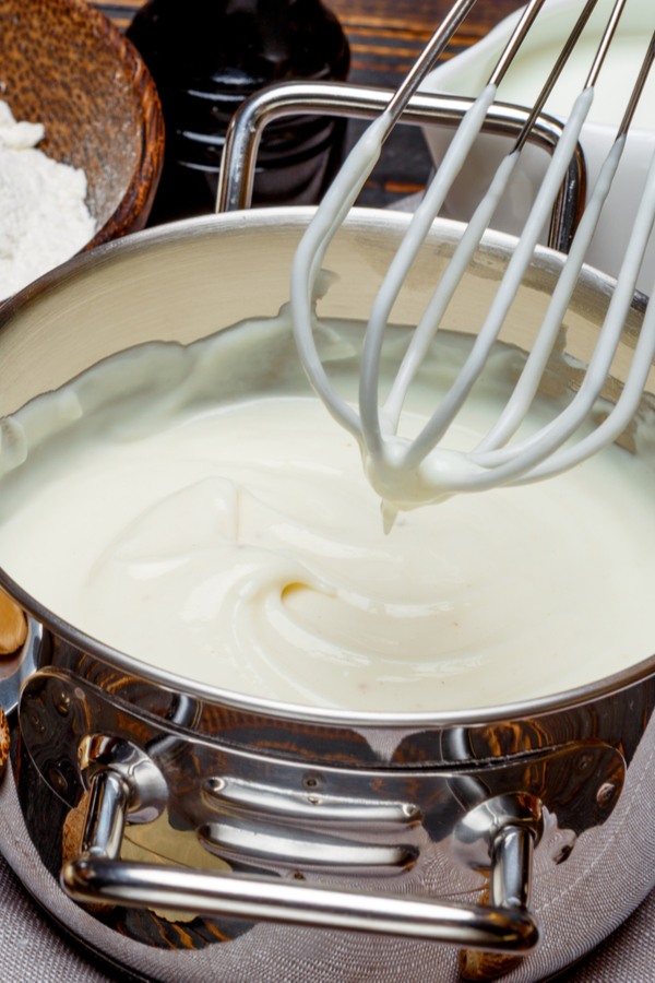 whisking mornay cheese sauce 