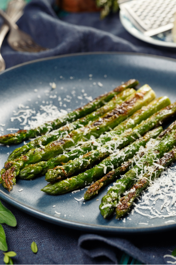 air fryer asparagus with Parmesan cheese on top 