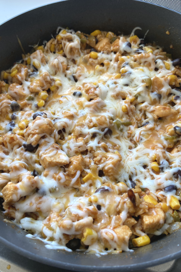 chicken burrito bowl topped with cheese
