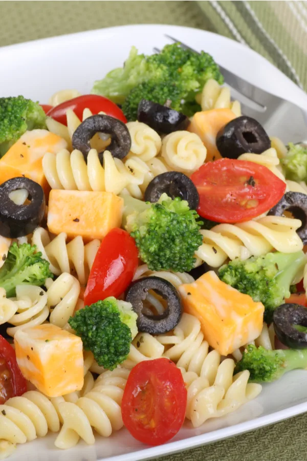 pasta salad with olives and cheese cubes