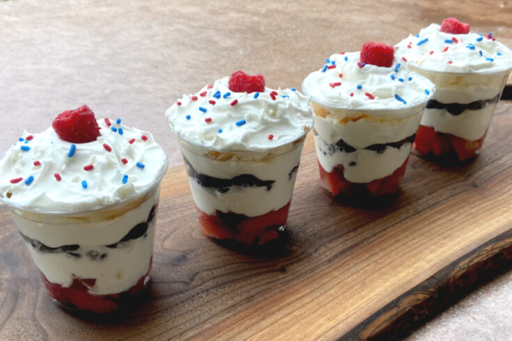 patriotic parfait cups on a wooden board