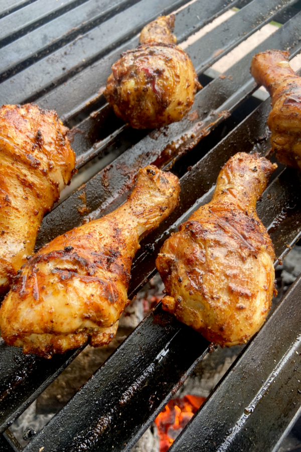 chicken legs cooked on a grill