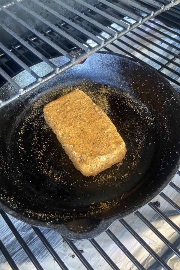 cast iron skillet on grill