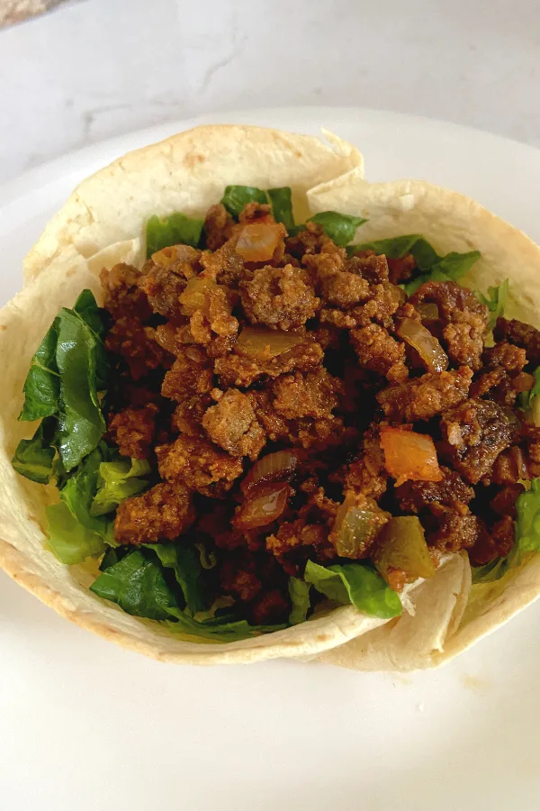 tortilla bowl with lettuce and ground beef