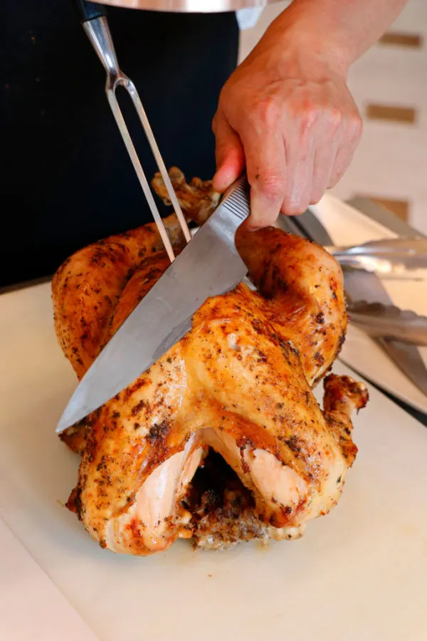 carving a whole smoked chicken