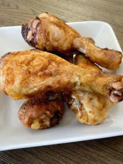 crispy baked chicken legs on plate
