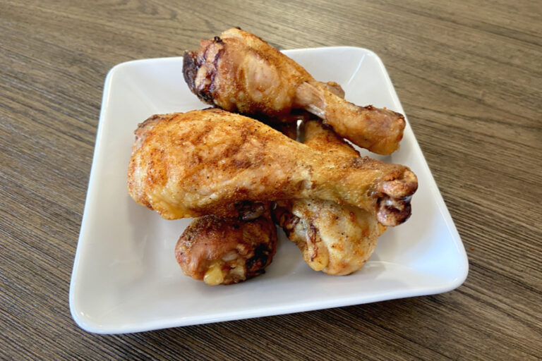 crispy baked chicken legs on plate