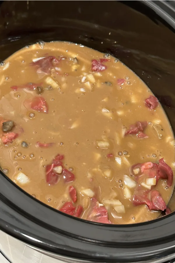Stew meat covered in gravy 