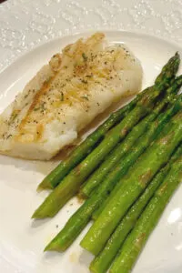 garlic butter cod and asparagus