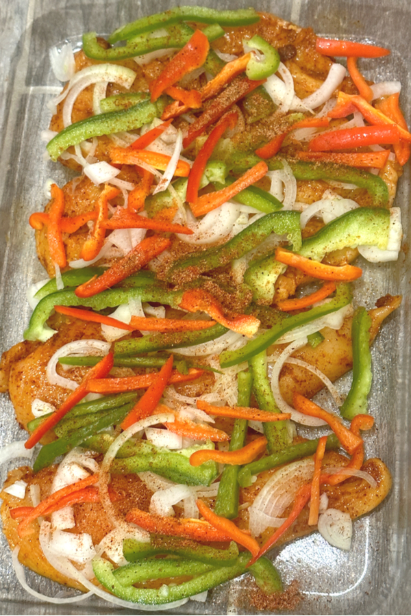 peppers and onions slices on chicken