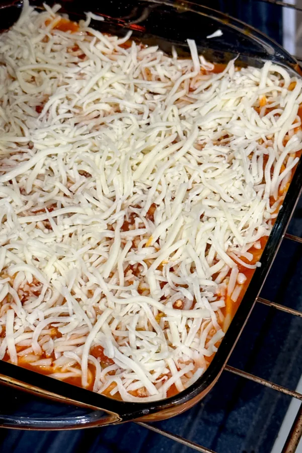 shredded cheese in baking dish