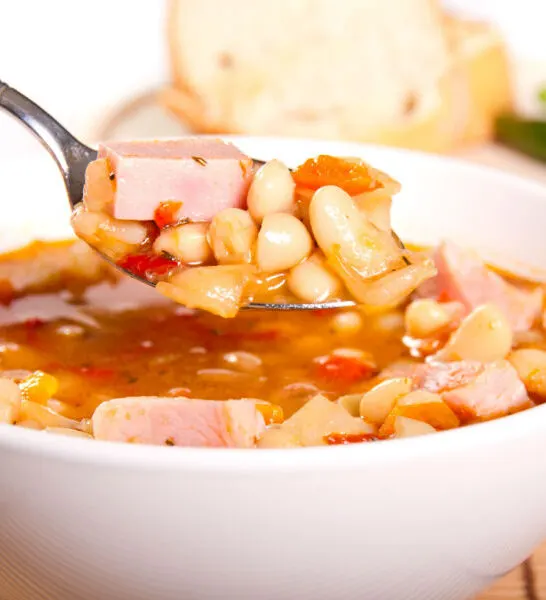 a bowl of crock pot ham and bean soup