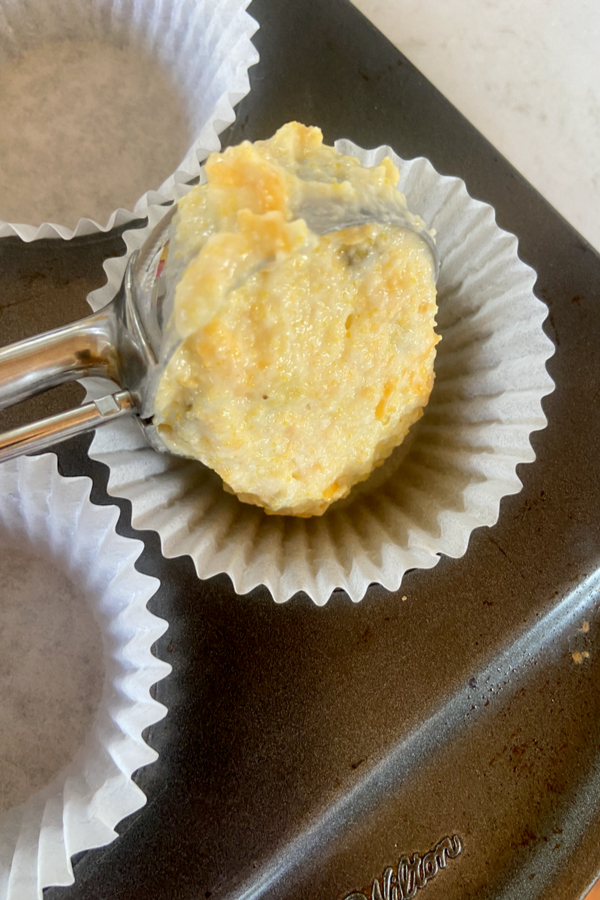 cookie scoop to fill muffin tins