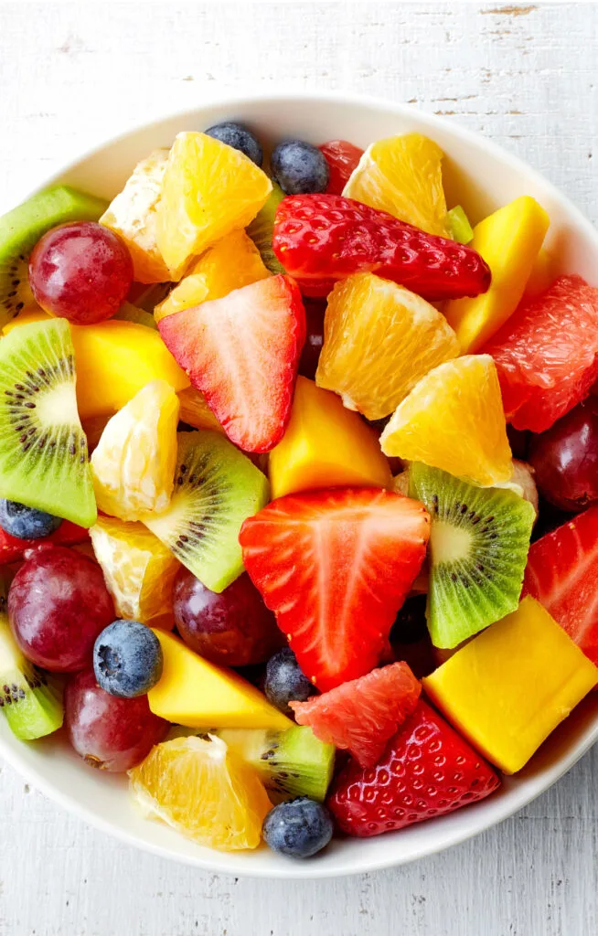 fruit salad in white bowl