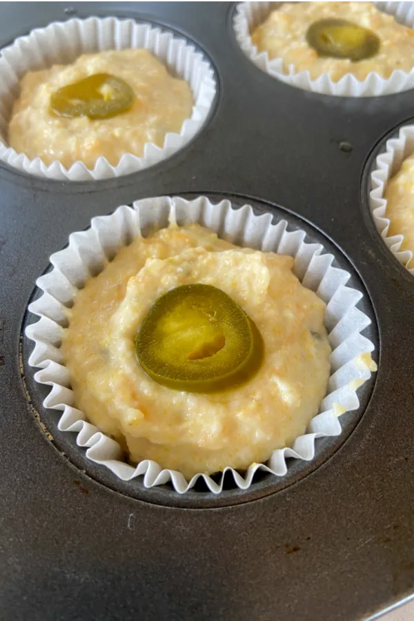 jalapeno slice on top of cheddar cornbread muffins 