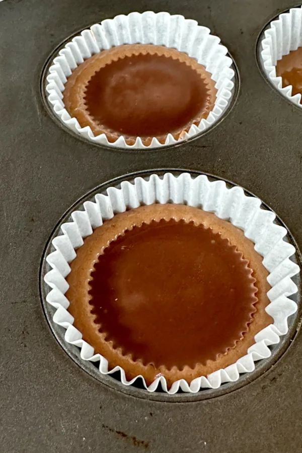 peanut butter cup in cupcake batter 
