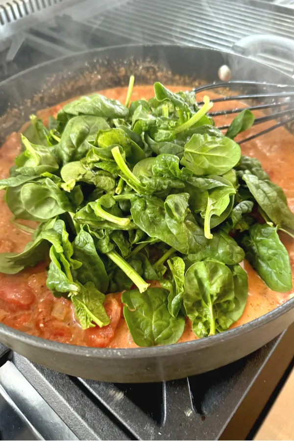 spinach in creamy tomato sauce 