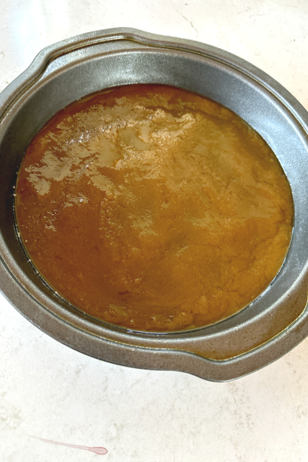 caramel sauce inside a 9 inch round pan 