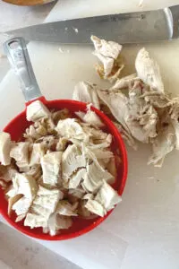 leftover rotisserie chicken being measured