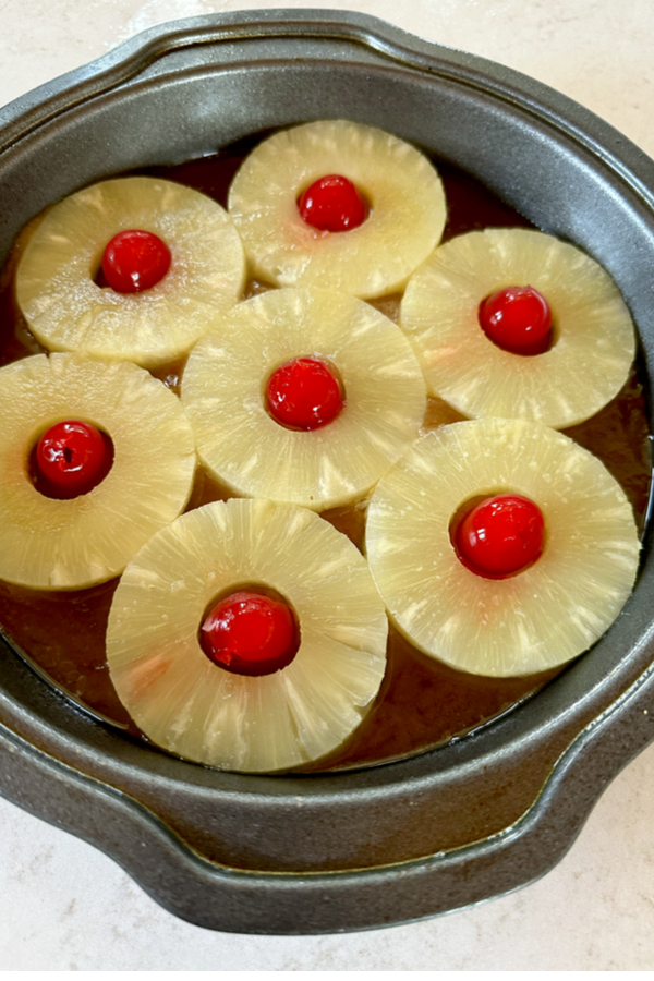 pineapple rings with cherries in the center 