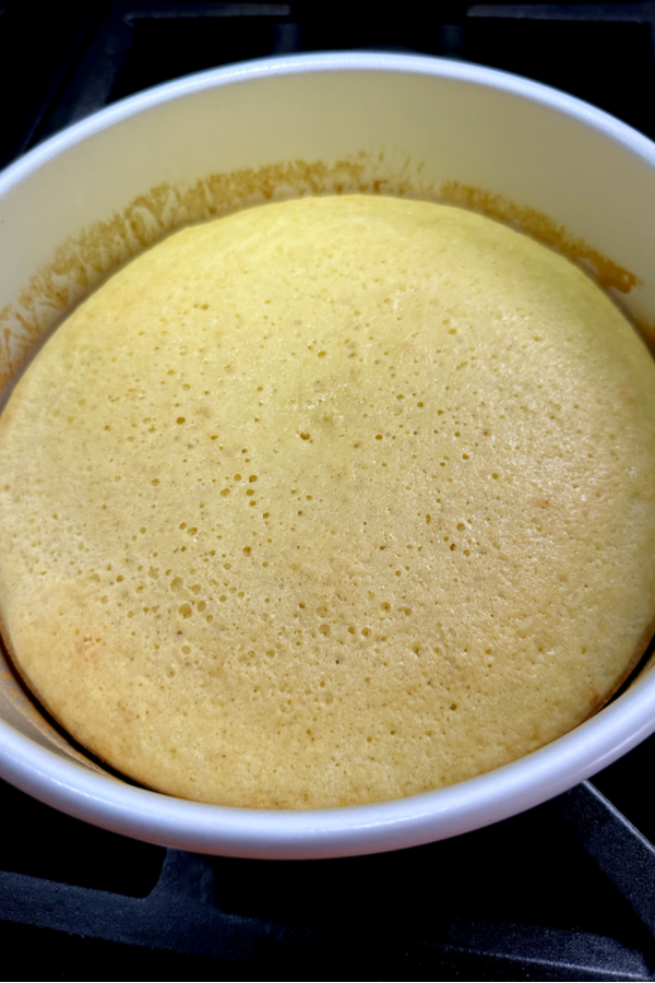 homemade sponge cake in a round pan