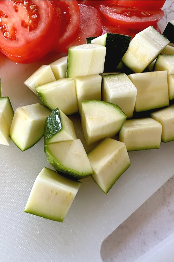 slices of tomatoes and chunks of zucchini 