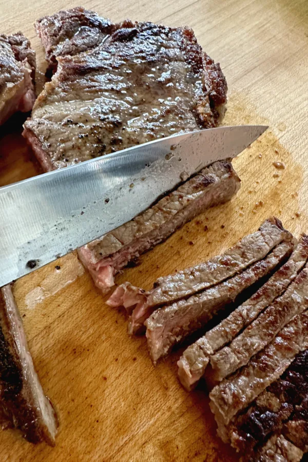slicing steak against the grain