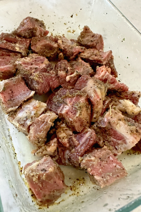 cut pieces of steak tossed in butter and spices