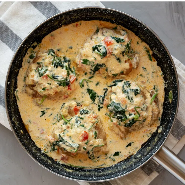 Tuscan chicken in a skillet